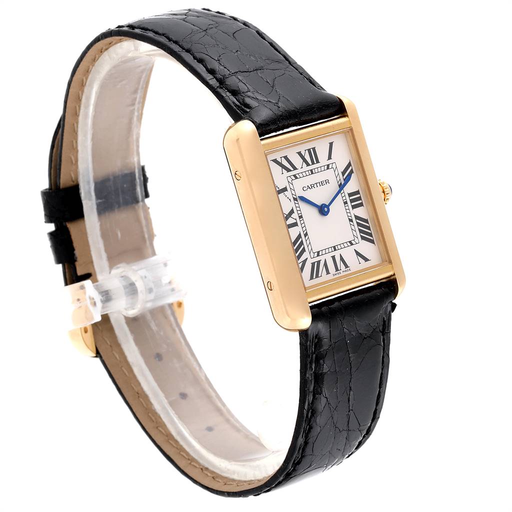 The Cartier Tank Solo W1018755 Women
s Steel and Gold (two tone) Silver Dial W1018755 Women
s Steel and Gold (two tone) Silver Dial watch is shown at an angle displaying the face, case, and black leather strap.
