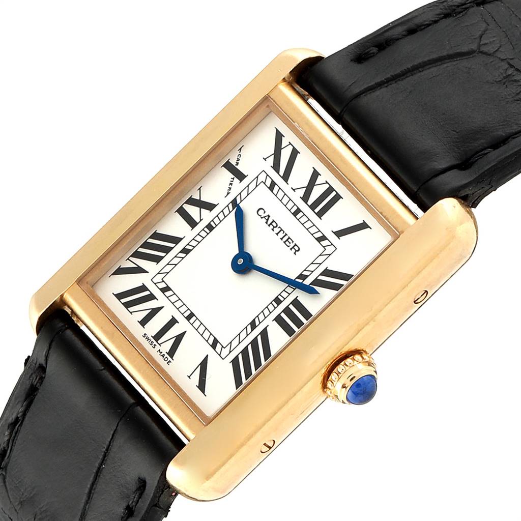The Cartier Tank Solo W1018755 Women
s Steel and Gold (two tone) Silver Dial W1018755 Women
s Steel and Gold (two tone) Silver Dial watch is shown from an angled top view, highlighting the face, Roman numerals, blue hands, and crown.