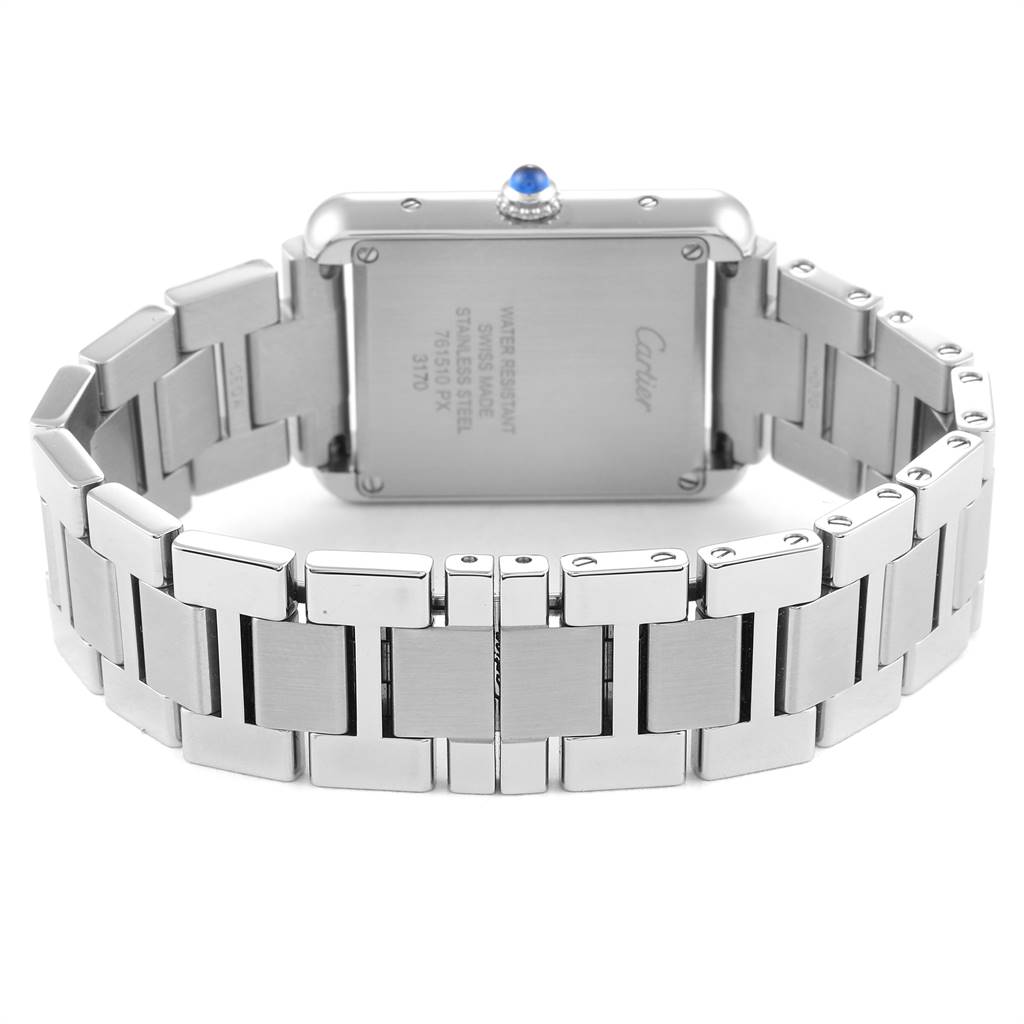 The image shows the back view of a Tank Solo model by Cartier, highlighting the stainless steel case and bracelet.