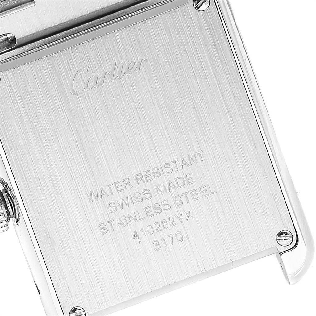 The image shows the back casing of a Cartier Tank Solo W5200013 Women's Stainless Steel Silver Dial W5200013 Women's Stainless Steel Silver Dial watch, featuring engraved details about its specifications.