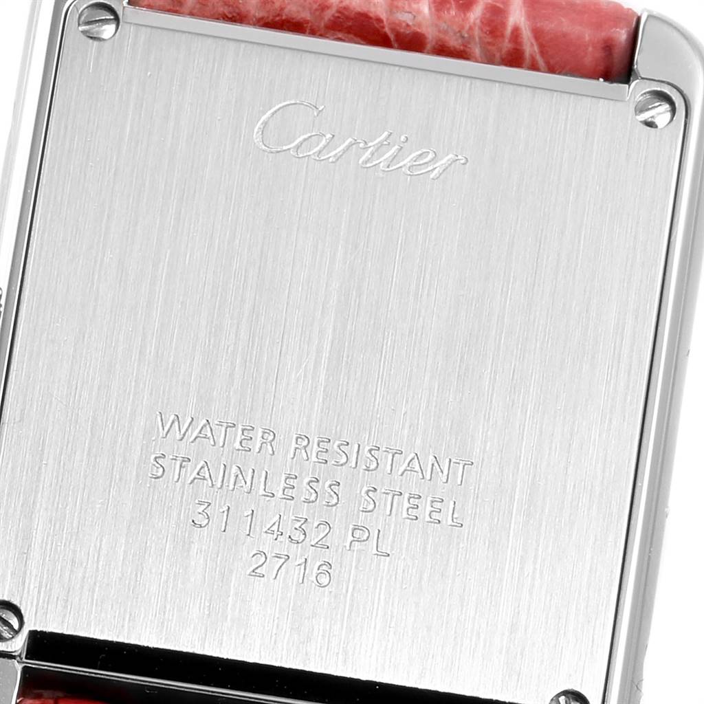 This is a close-up of the back case of a Cartier Tank Solo W5200005 Women's Stainless Steel Silver Dial W5200005 Women's Stainless Steel Silver Dial watch showing the brand engraving and water resistance markings.