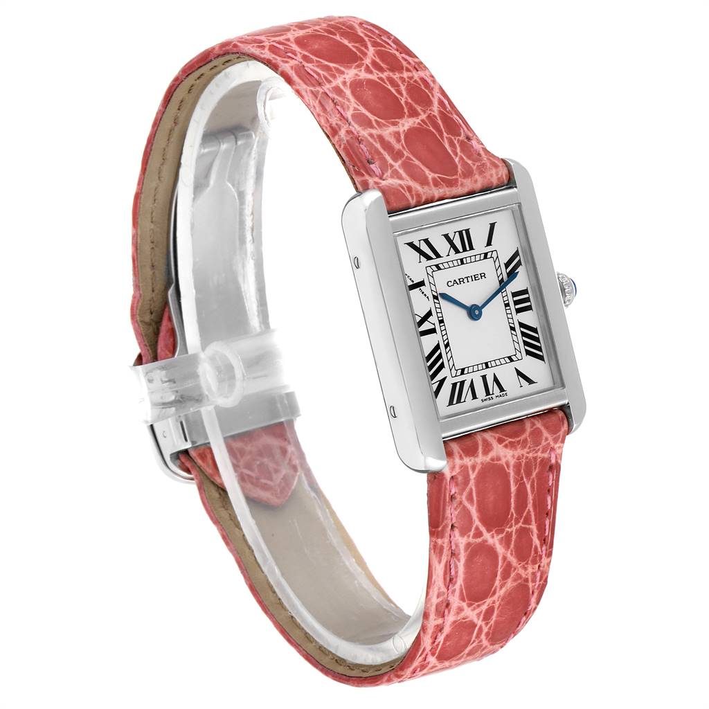The watch is a Cartier Tank Solo W5200005 Women's Stainless Steel Silver Dial W5200005 Women's Stainless Steel Silver Dial, showing a side angle and featuring a rectangular face with a pink leather strap.