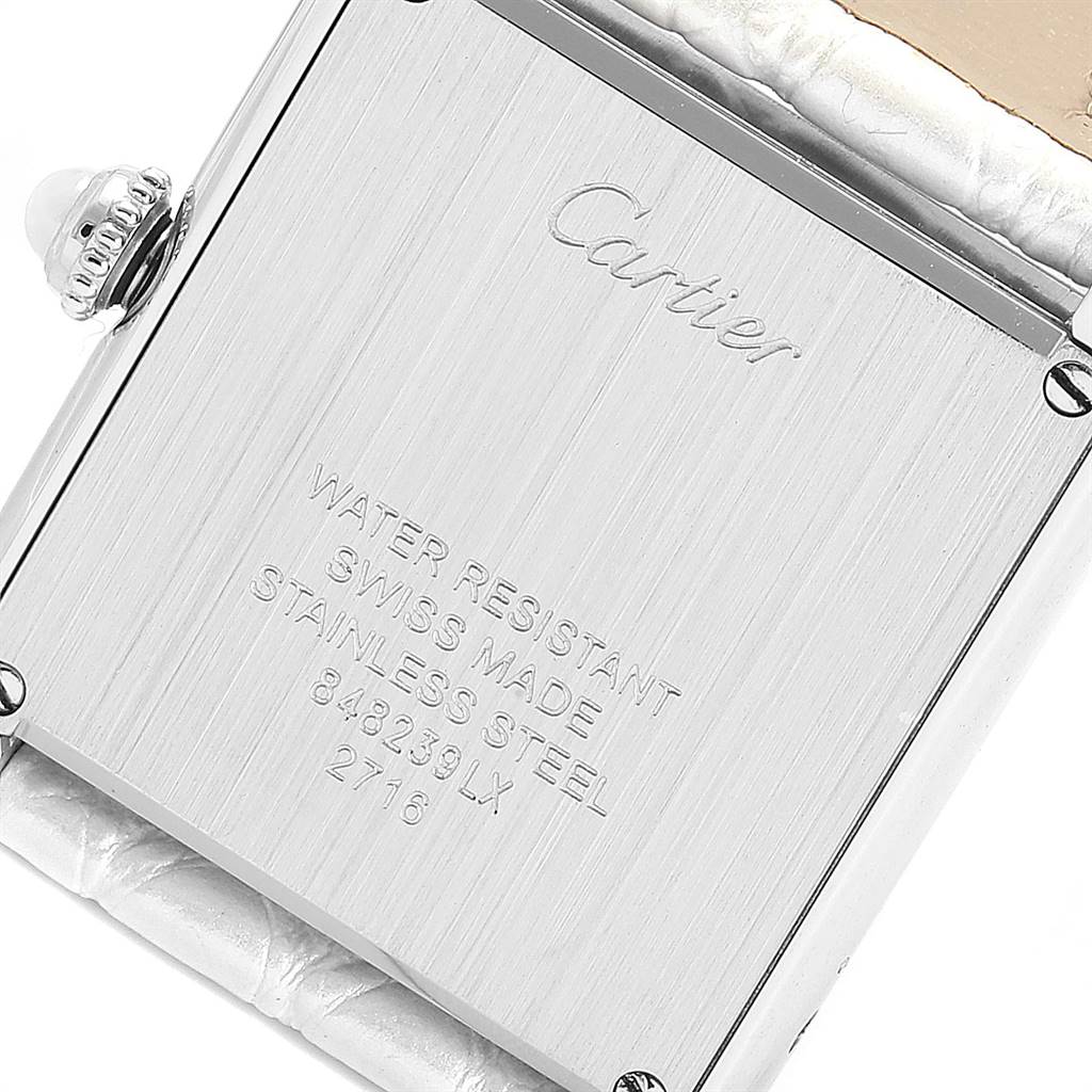 This image shows the back case of the Cartier Tank Solo W1019555 Women's Stainless Steel Silver Dial W1019555 Women's Stainless Steel Silver Dial watch, highlighting its water resistance, Swiss made, and stainless steel features.