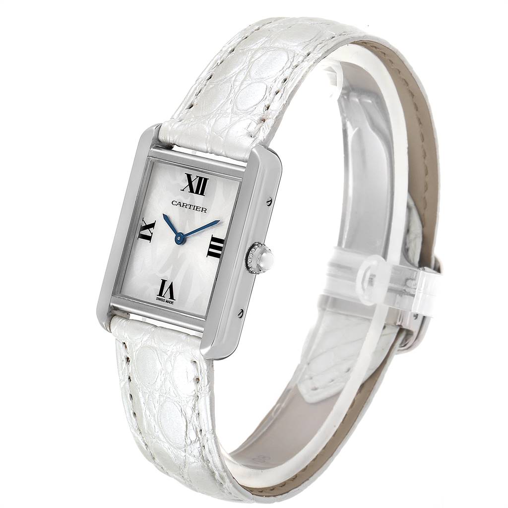 The Cartier Tank Solo W1019555 Women's Stainless Steel Silver Dial W1019555 Women's Stainless Steel Silver Dial watch is shown at a side angle, showcasing its rectangular dial, Roman numerals, and white leather strap.