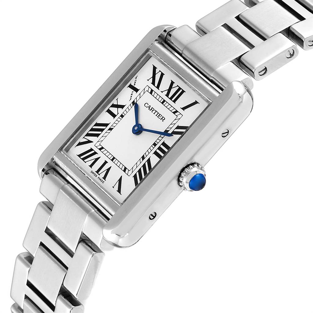 This image shows a Cartier Tank Solo W5200013 Women
s Stainless Steel Silver Dial W5200013 Women
s Stainless Steel Silver Dial watch angled to display its face, crown with a blue gem, and part of its metal bracelet.