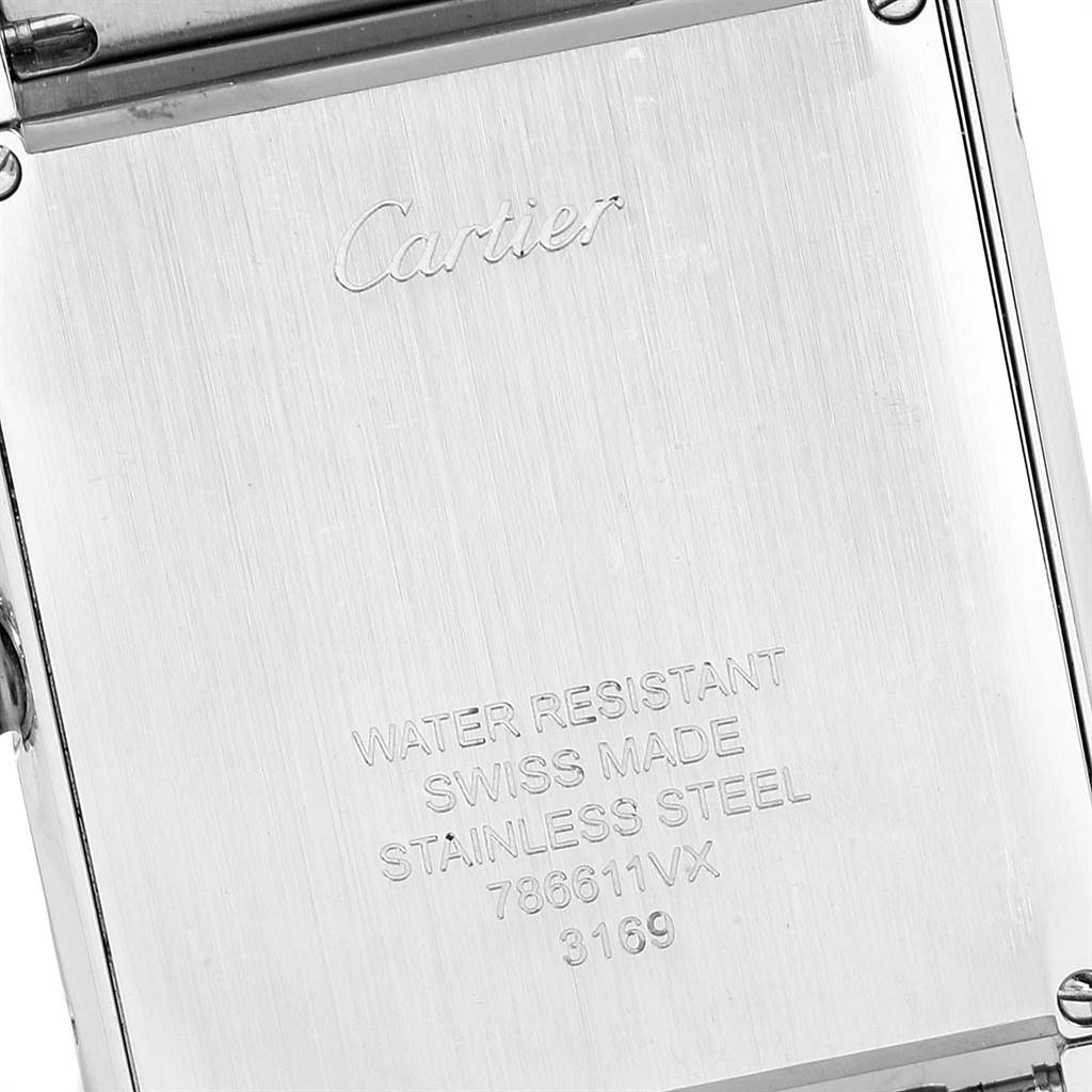 The image shows the back case of a Cartier Tank Solo W5200014 Men's Stainless Steel Silver Dial W5200014 Men's Stainless Steel Silver Dial watch, featuring the brand name and details about water resistance, material, and model number.
