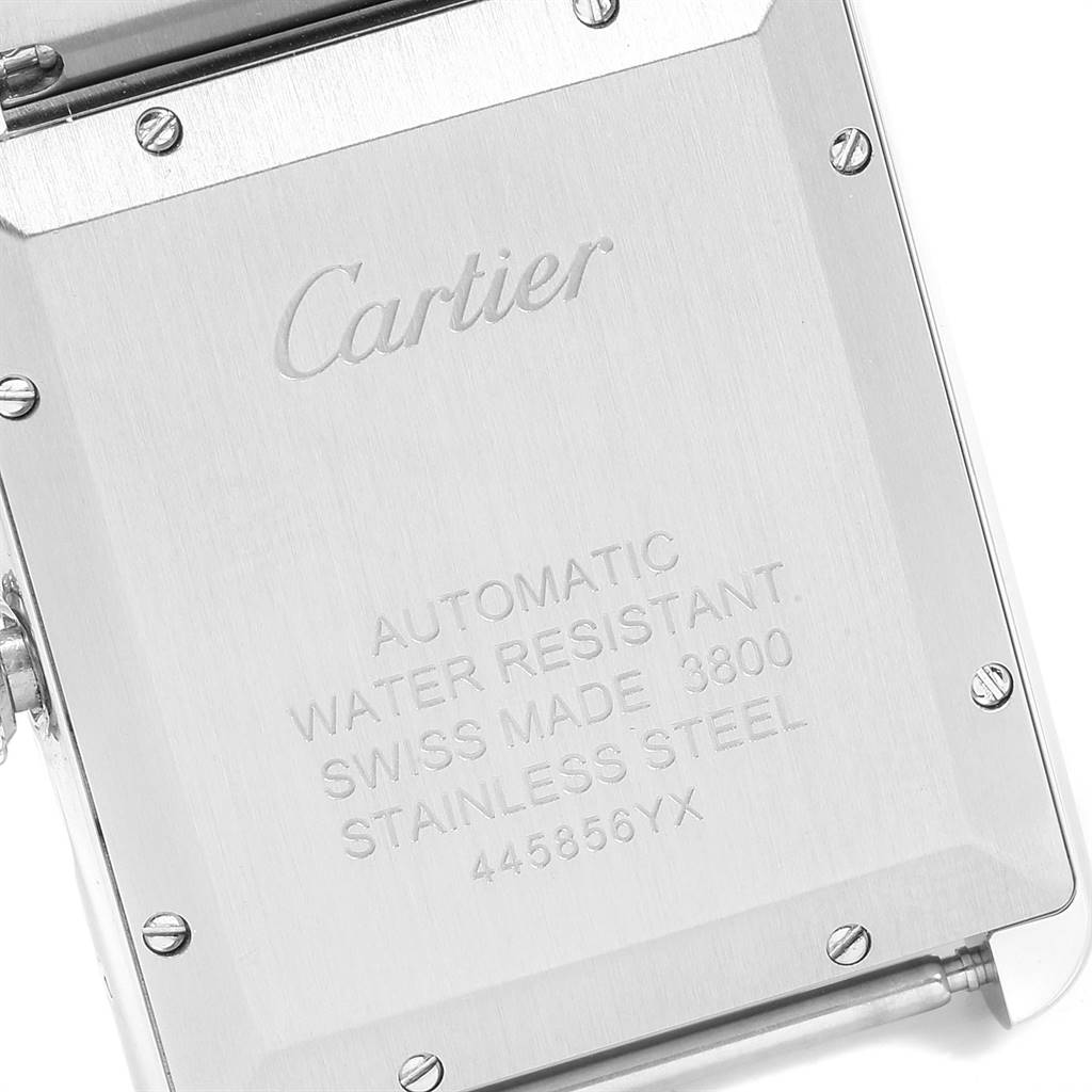 The image shows the back case of a Cartier Tank Solo W5200028 Men
s Stainless Steel Silver Dial W5200028 Men
s Stainless Steel Silver Dial watch, highlighting its specifications and screws.