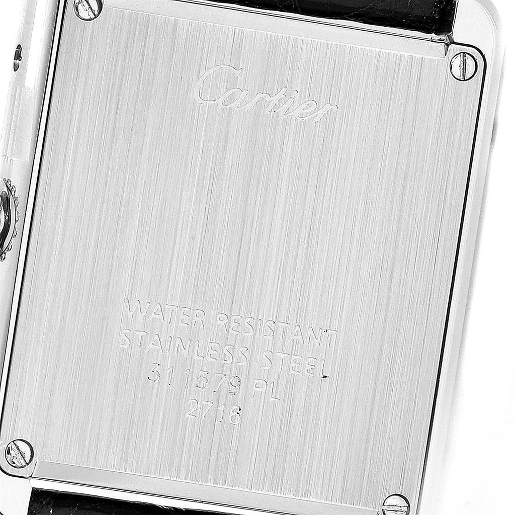 The image shows the back case of the Cartier Tank Solo W1018255 Women's Stainless Steel Silver Dial W1018255 Women's Stainless Steel Silver Dial watch, with visible engravings and screws.