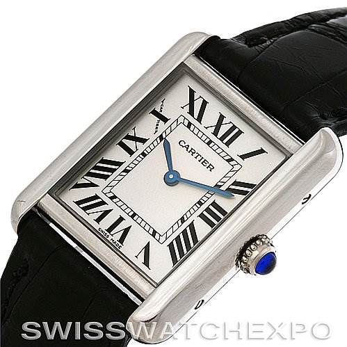 The image shows a close-up angled view of the Tank Solo watch by Cartier, highlighting its rectangular face, Roman numerals, and crown.