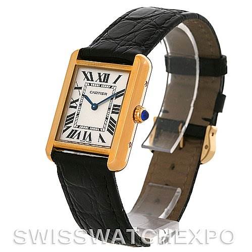 This image shows a Cartier Tank Solo W1018755 Women's Steel and Gold (two tone) Silver Dial W1018755 Women's Steel and Gold (two tone) Silver Dial watch at a three-quarter angle, highlighting its gold rectangular case, black leather strap, and Roman numeral dial.
