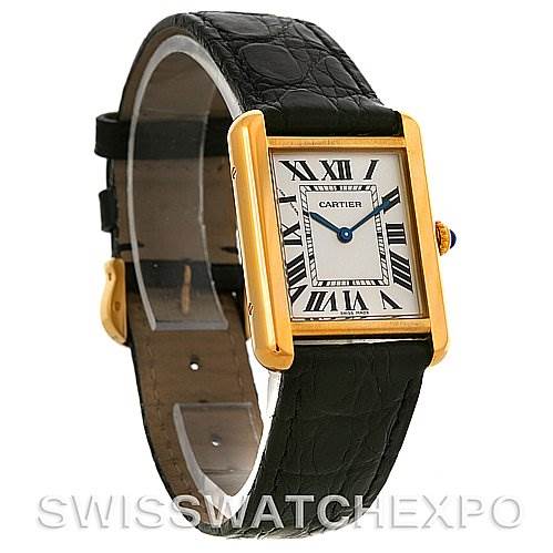 This image shows a Cartier Tank Solo W1018755 Women's Steel and Gold (two tone) Silver Dial W1018755 Women's Steel and Gold (two tone) Silver Dial watch at a three-quarter angle displaying the black leather strap, rectangular gold case, Roman numeral dial, and blue hands.