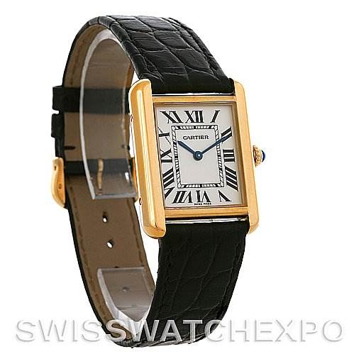 The image shows a Cartier Tank Solo W1018755 Women
s Steel and Gold (two tone) Silver Dial W1018755 Women
s Steel and Gold (two tone) Silver Dial watch at an angle, highlighting its rectangular face, Roman numerals, and black leather strap.