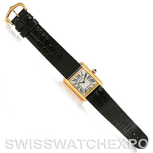 The image shows a top-down view of a Cartier Tank Solo W1018755 Women
s Steel and Gold (two tone) Silver Dial W1018755 Women
s Steel and Gold (two tone) Silver Dial watch with its face, strap, and buckle visible.