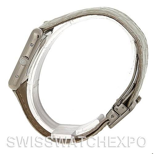 The image shows a Cartier Tank Solo W1019555 Women's Stainless Steel Silver Dial W1019555 Women's Stainless Steel Silver Dial watch from a side angle, highlighting the crown, case, and leather strap.