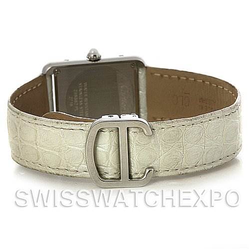 The image shows the back view of a Cartier Tank Solo W1019555 Women's Stainless Steel Silver Dial W1019555 Women's Stainless Steel Silver Dial watch, including the watch case back and the beige leather strap with a buckle.