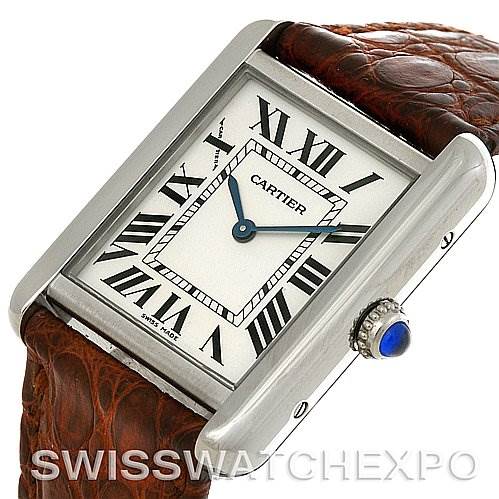 The image shows a Cartier Tank Solo W1018255 Women's Stainless Steel Silver Dial W1018255 Women's Stainless Steel Silver Dial watch at a slight angle, highlighting its brown leather strap, rectangular face, silver case, Roman numerals, and blue cabochon crown.