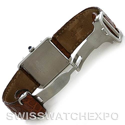 The image shows the back of a Cartier Tank Solo W1018255 Women's Stainless Steel Silver Dial W1018255 Women's Stainless Steel Silver Dial watch and its brown leather strap with a stainless steel deployment clasp.