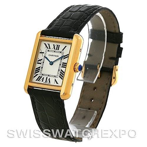 The image shows a side angle of the Tank Solo model by Cartier, highlighting the rectangular face and black leather strap.