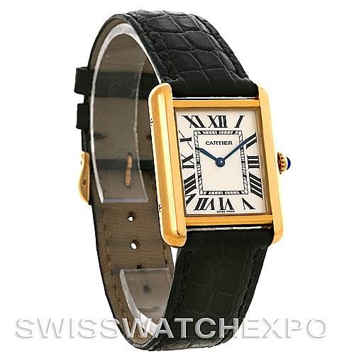 This image shows a Cartier Tank Solo W1018755 Women's Steel and Gold (two tone) Silver Dial W1018755 Women's Steel and Gold (two tone) Silver Dial watch at a slight angle, revealing the watch face, case, strap, and crown with a blue gemstone.