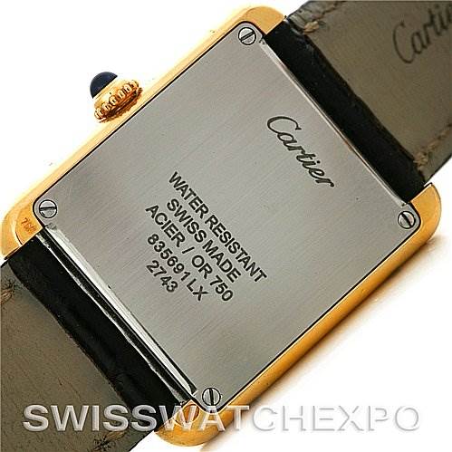 This image shows the back case of a Cartier Tank Solo W1018755 Women's Steel and Gold (two tone) Silver Dial W1018755 Women's Steel and Gold (two tone) Silver Dial watch, highlighting the brand's engravings and specifications.