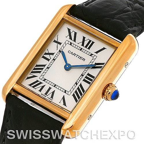 This image shows a Cartier Tank Solo W1018755 Women
s Steel and Gold (two tone) Silver Dial W1018755 Women
s Steel and Gold (two tone) Silver Dial watch at a slight angle, featuring its rectangular gold case, Roman numeral dial, and black leather strap.