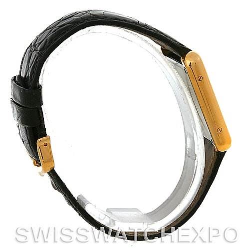 This image shows a side view of the Cartier Tank Solo W1018755 Women
s Steel and Gold (two tone) Silver Dial W1018755 Women
s Steel and Gold (two tone) Silver Dial watch, focusing on the case, bezel, and strap.