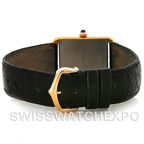 This image shows the back view of a Cartier Tank Solo W1018755 Women
s Steel and Gold (two tone) Silver Dial W1018755 Women
s Steel and Gold (two tone) Silver Dial watch, highlighting the leather strap and gold buckle.