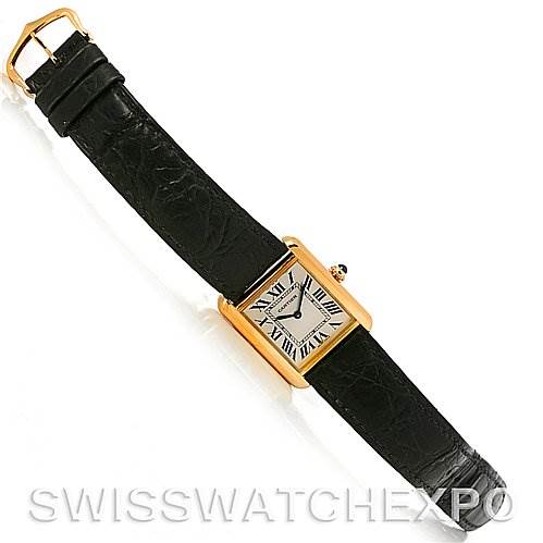 The image shows a Cartier Tank Solo W1018755 Women
s Steel and Gold (two tone) Silver Dial W1018755 Women
s Steel and Gold (two tone) Silver Dial watch from a top-down angle, featuring its entire face, case, and black leather strap.