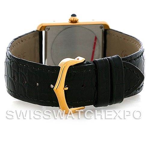 The image shows the back side and clasp of a Cartier Tank Solo W1018755 Women's Steel and Gold (two tone) Silver Dial W1018755 Women's Steel and Gold (two tone) Silver Dial watch, highlighting the leather strap and gold buckle.