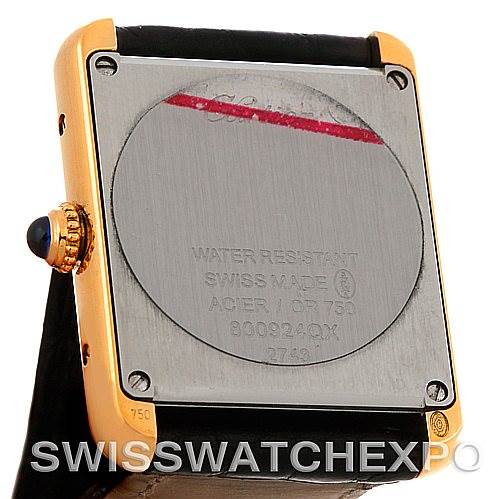 The image shows the back of a Cartier Tank Solo W1018755 Women's Steel and Gold (two tone) Silver Dial W1018755 Women's Steel and Gold (two tone) Silver Dial watch, featuring its case back, crown, and strap attachment.