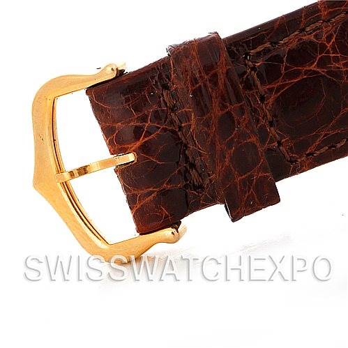 The image shows the leather strap and gold buckle of a Cartier Tank Solo W1018755 Women's Steel and Gold (two tone) Silver Dial W1018755 Women's Steel and Gold (two tone) Silver Dial watch, branded "SwissWatchExpo."