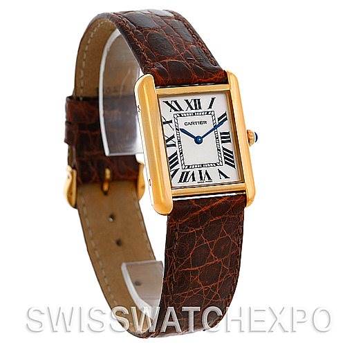 The Cartier Tank Solo W1018755 Women's Steel and Gold (two tone) Silver Dial W1018755 Women's Steel and Gold (two tone) Silver Dial watch is shown at a three-quarter angle, highlighting its face, strap, and rectangular gold case.