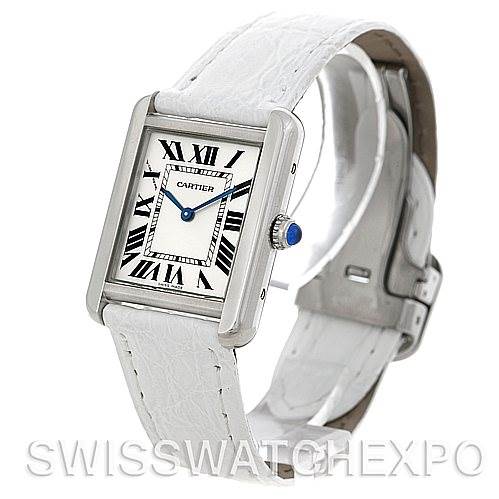 The image shows a Cartier Tank Solo W1018255 Women's Stainless Steel Silver Dial W1018255 Women's Stainless Steel Silver Dial watch with a white leather strap, viewed at an angle showcasing the face, casing, and buckle.