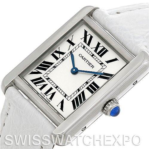 The image shows a close-up of a Cartier Tank Solo W1018255 Women's Stainless Steel Silver Dial W1018255 Women's Stainless Steel Silver Dial watch, displaying the rectangular face, Roman numeral markers, and part of the white strap.