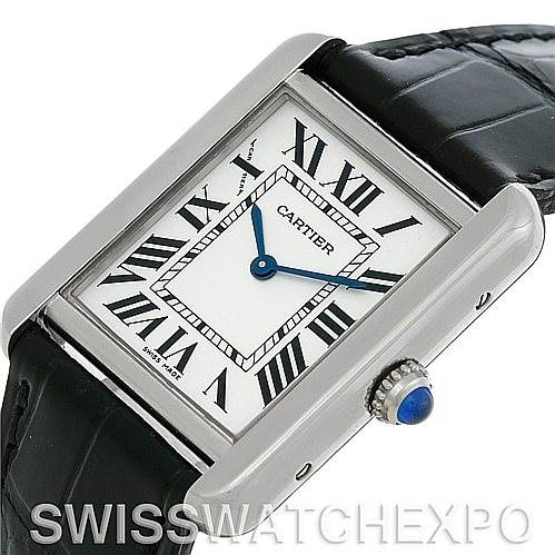 This image shows a close-up, angled view of the Cartier Tank Solo W1018255 Women's Stainless Steel Silver Dial W1018255 Women's Stainless Steel Silver Dial watch, highlighting its face, Roman numerals, and crown jewel.