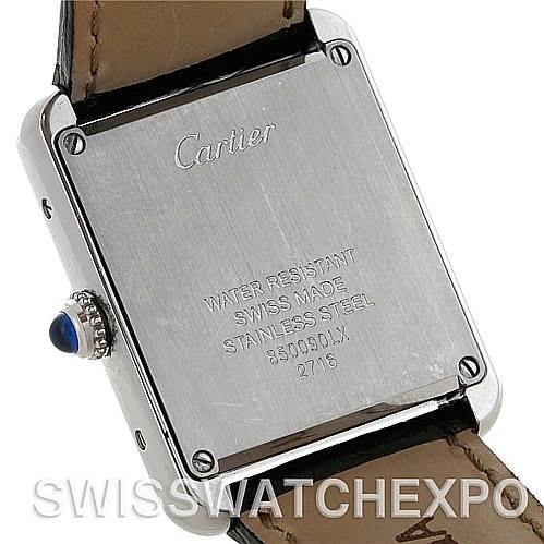 The image shows the back case and crown of a Cartier Tank Solo W1018255 Women's Stainless Steel Silver Dial W1018255 Women's Stainless Steel Silver Dial watch, highlighting the engravings and leather strap.