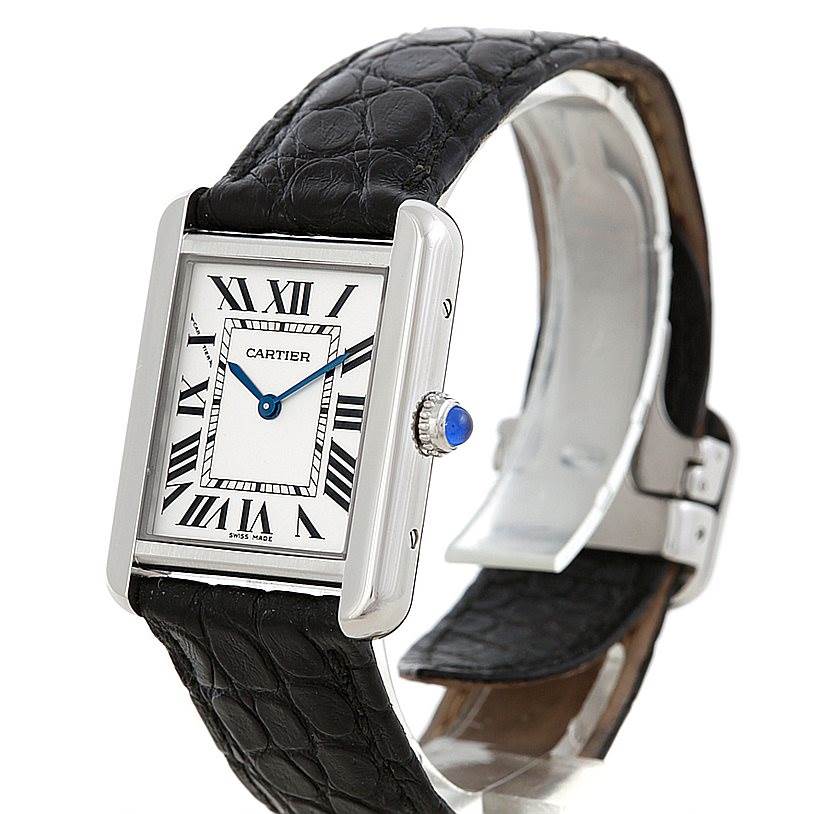 The Cartier Tank Solo W1018255 Women's Stainless Steel Silver Dial W1018255 Women's Stainless Steel Silver Dial watch is shown at an angle displaying the face, Roman numerals, crown, and black leather strap.