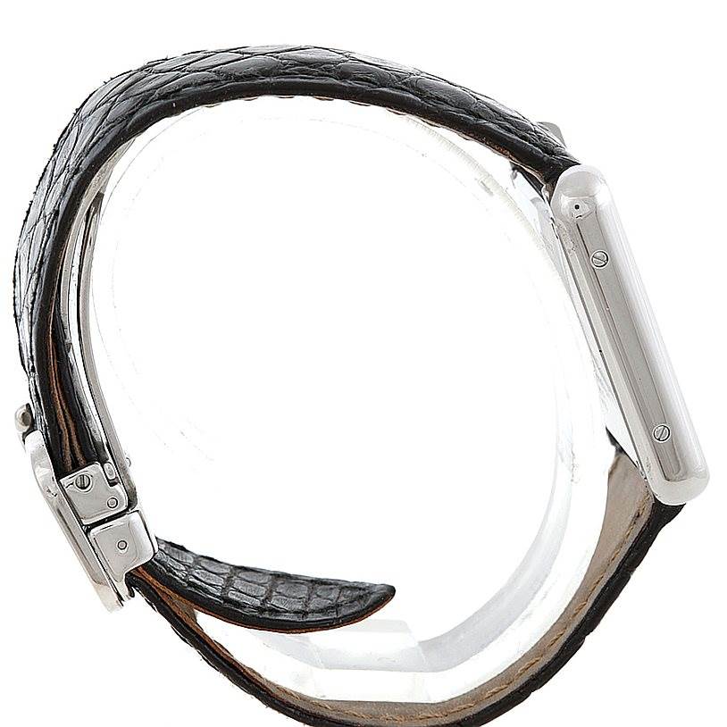 The image shows a side view of the Cartier Tank Solo W1018255 Women's Stainless Steel Silver Dial W1018255 Women's Stainless Steel Silver Dial watch with its black leather strap and polished metal case.