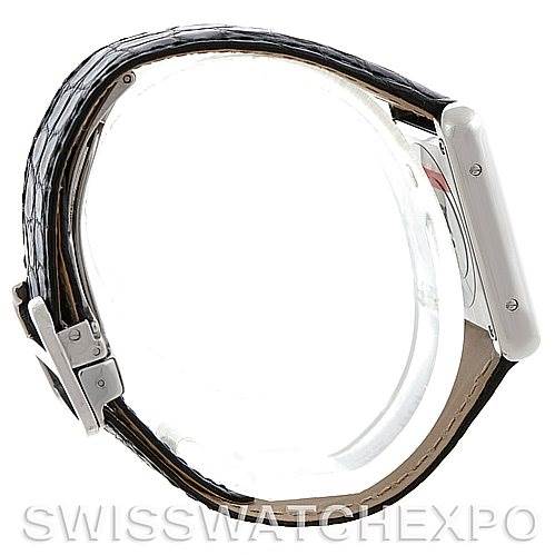 The image shows a side profile of a Cartier Tank Solo W1018255 Women's Silver Dial W1018255 Women's Silver Dial watch, highlighting its case, crown, and leather strap.