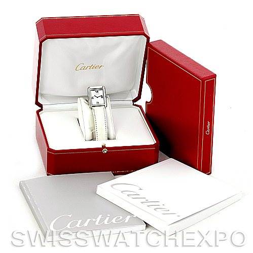 The image shows a Cartier Tank Solo W1019555 Women's Stainless Steel Silver Dial W1019555 Women's Stainless Steel Silver Dial watch placed in an open red Cartier box, accompanied by its outer box and manuals.