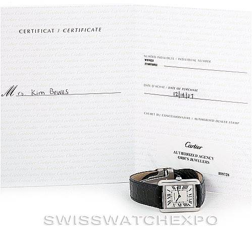 The image shows a Cartier Tank Solo W1018255 Women's Stainless Steel Silver Dial W1018255 Women's Stainless Steel Silver Dial watch with a black leather strap, accompanied by its certification paperwork from SWISSWATCHEXPO.