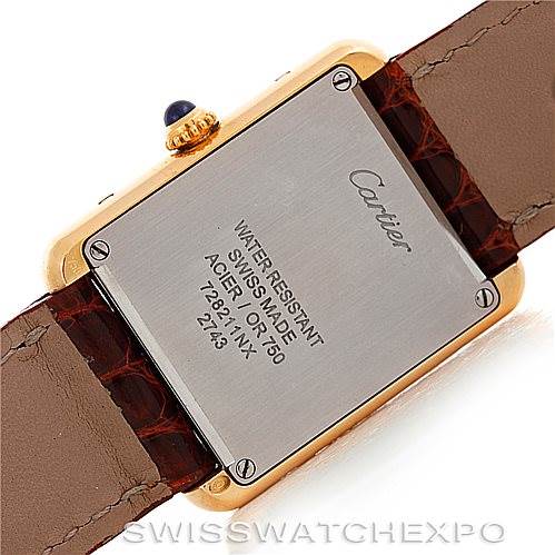 The image shows the back case of a Cartier Tank Solo W1018755 Women's Steel and Gold (two tone) Silver Dial W1018755 Women's Steel and Gold (two tone) Silver Dial watch, highlighting its water resistance, Swiss made markings, and leather straps.