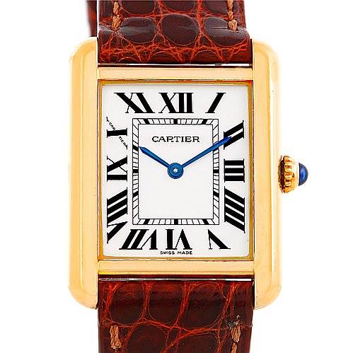 This is a front view of the Cartier Tank Solo W1018755 Women's Steel and Gold (two tone) Silver Dial W1018755 Women's Steel and Gold (two tone) Silver Dial watch, showcasing its face, Roman numerals, hands, and part of the strap.