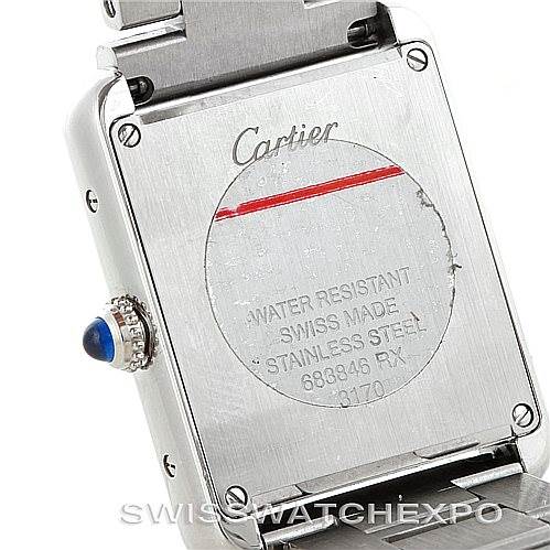 This image shows the back case of a Cartier Tank Solo W5200013 Women's Stainless Steel Silver Dial W5200013 Women's Stainless Steel Silver Dial watch, including the brand engraving and crown with a blue gemstone.
