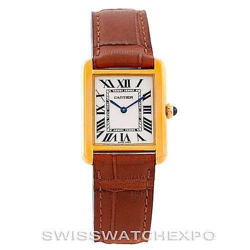 This Cartier Tank Solo W1018755 Women's Steel and Gold (two tone) Silver Dial W1018755 Women's Steel and Gold (two tone) Silver Dial watch is shown from a front angle, displaying its rectangular face, Roman numeral dial, and brown leather strap.