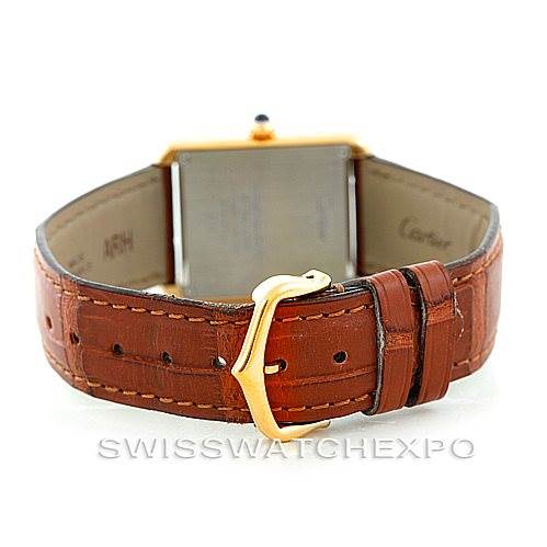 This image shows the back view of a Cartier Tank Solo W1018755 Women's Steel and Gold (two tone) Silver Dial W1018755 Women's Steel and Gold (two tone) Silver Dial watch, highlighting its leather strap and buckle.