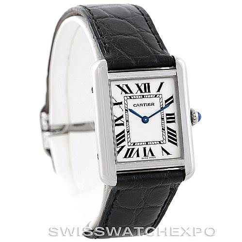 The image shows a front angle of the Cartier Tank Solo W1018255 Women's Stainless Steel Silver Dial W1018255 Women's Stainless Steel Silver Dial watch, highlighting its rectangular face, black Roman numerals, and black leather strap.