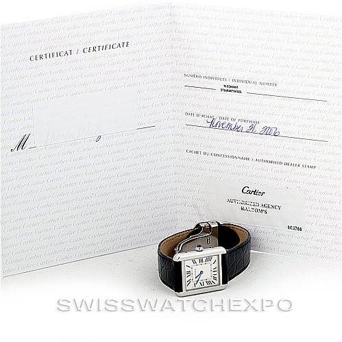 The image shows a Cartier Tank Solo W1018255 Women's Stainless Steel Silver Dial W1018255 Women's Stainless Steel Silver Dial watch with a black leather strap along with its certificate and documentation.