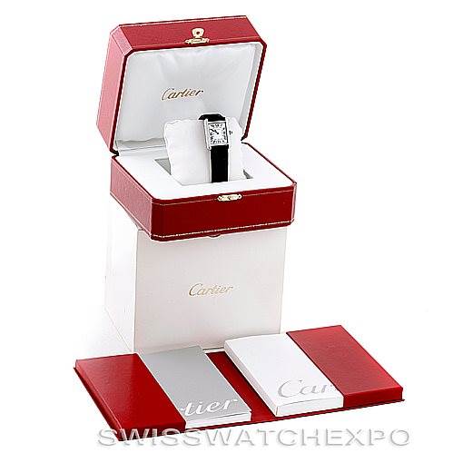 The image shows the Cartier Tank Solo W1018255 Women's Stainless Steel Silver Dial W1018255 Women's Stainless Steel Silver Dial watch from a top-front angle, along with its open box and assorted documentation.