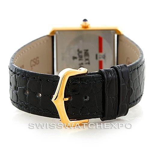 The image shows the back view of the Cartier Tank Solo W1018755 Women's Steel and Gold (two tone) Silver Dial W1018755 Women's Steel and Gold (two tone) Silver Dial watch, focusing on the black leather strap and gold buckle.